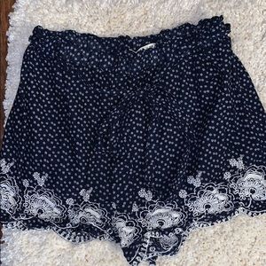navy embroidered and patterned shorts